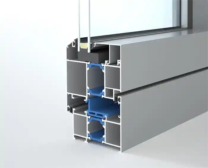 Cross-section of a thermally broken aluminum window frame showing double glazing, warm-edge spacers, and polyamide thermal breaks.
