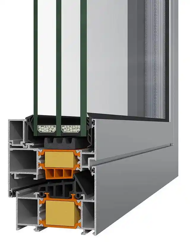 Cross-section of a high-performance thermal break aluminum window profile featuring triple glazing, wide PA66 insulation strips, and PU foam inserts for passive house standards.